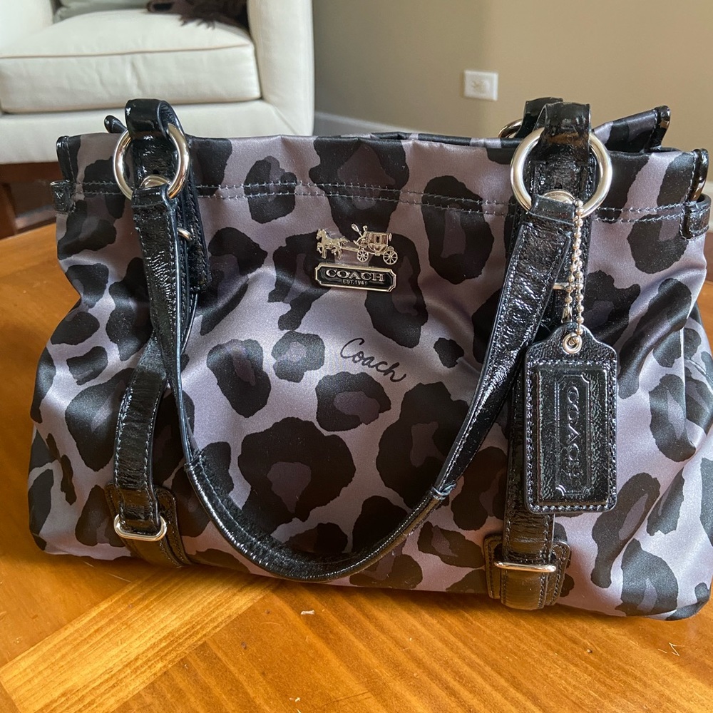 Coach black and gray leopard hand bag